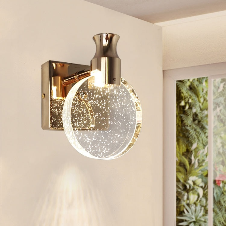 Applique murale ronde en métal et anneau de verre