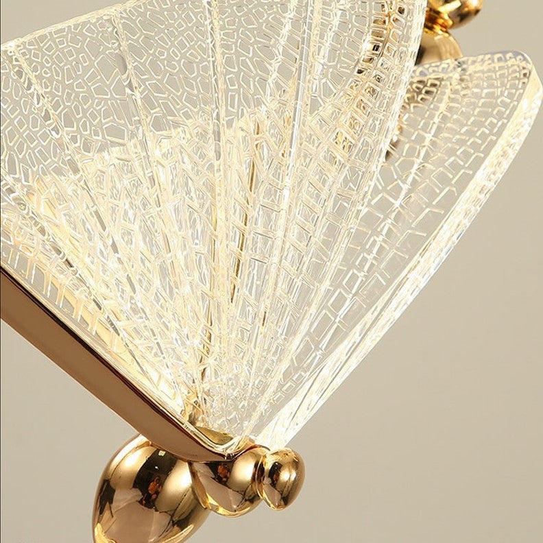 Suspension forme de papillon or et verre