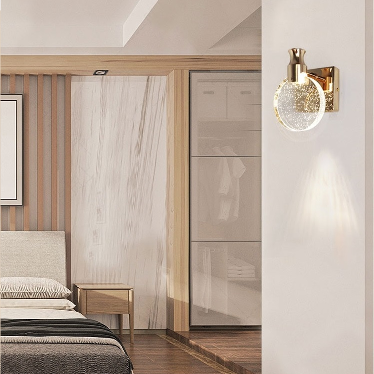 Applique murale ronde en métal et anneau de verre