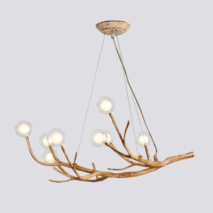 Lustre branche d’arbre orné de boules de verre