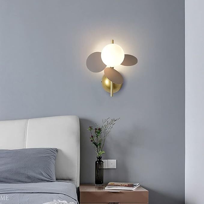 Applique murale fleurie en acier brossé