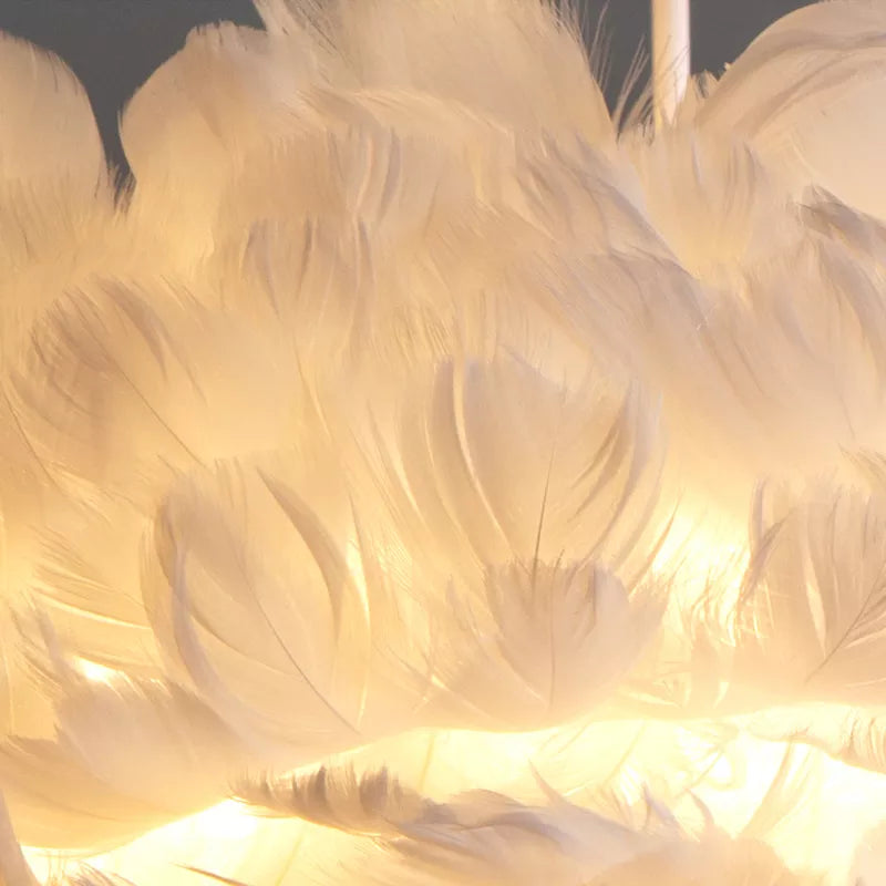 Suspension boule ornée de plumes, rose, blanc, gris, rouge ou jaune