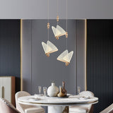 Suspension forme de papillon or et verre