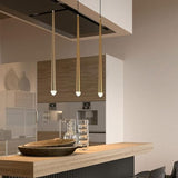 Suspension / Lustre pendant de chevet en aluminium noir et or au design minimaliste et moderne en forme de tube métal