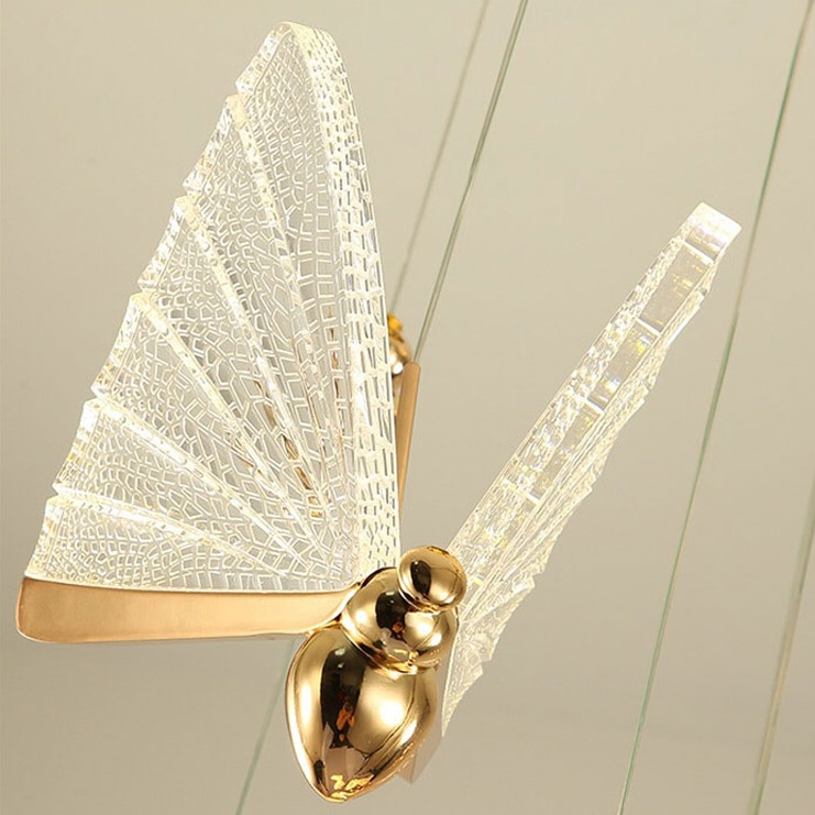 Suspension forme de papillon or et verre