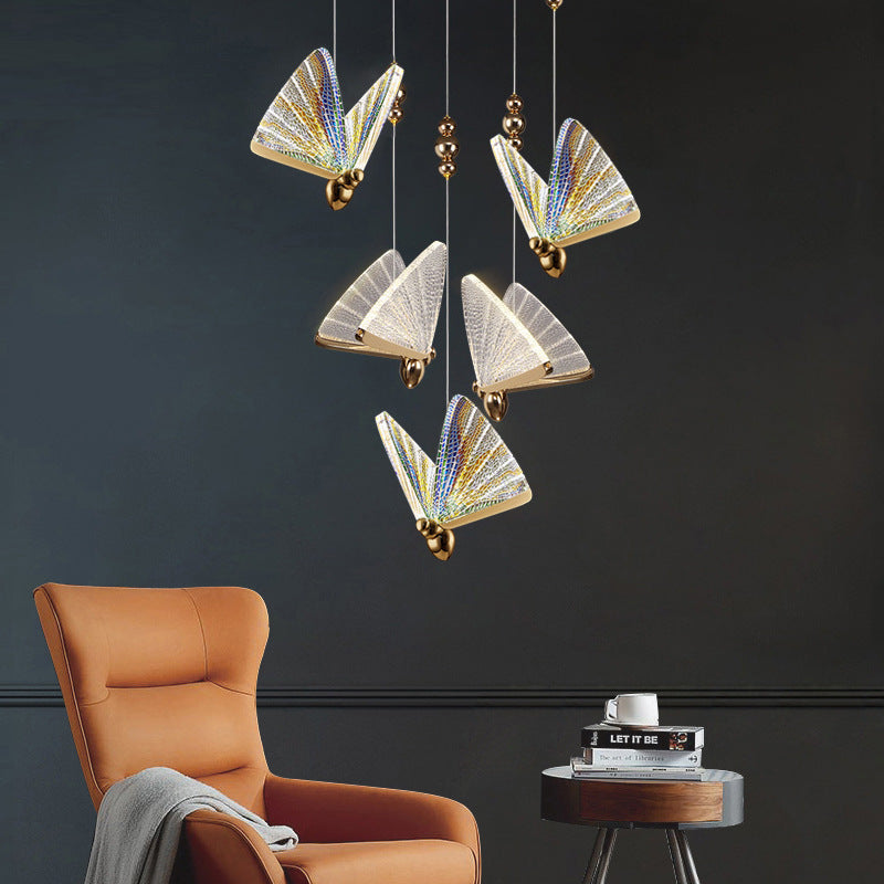 Suspension forme de papillon or et verre