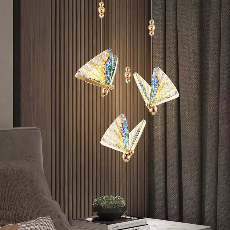 Suspension forme de papillon or et verre