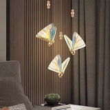 Suspension forme de papillon or et verre
