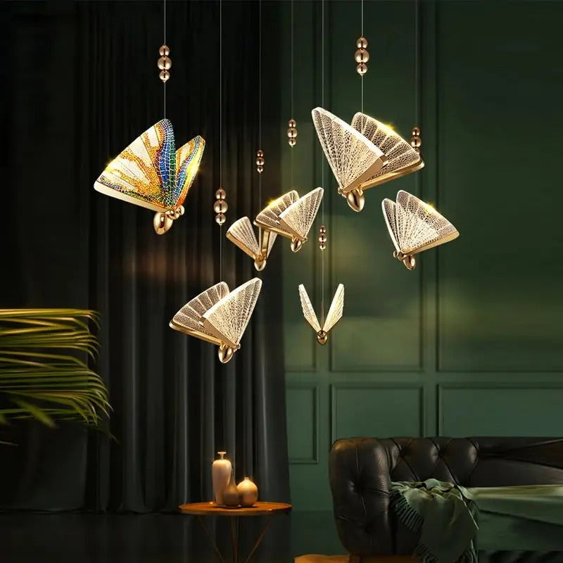 Suspension forme de papillon or et verre