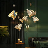 Suspension forme de papillon or et verre