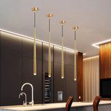 Suspension / Lustre pendant de chevet en aluminium noir et or au design minimaliste et moderne en forme de tube métal