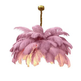Lustre doré en plumes blanches en forme de palmier